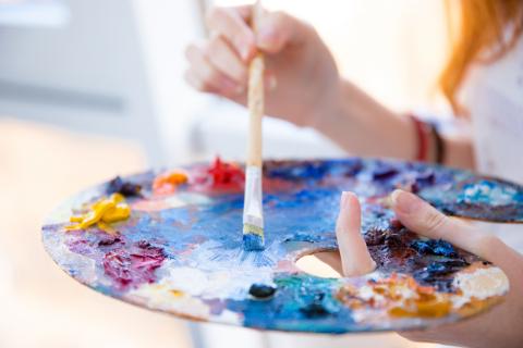 Art palette with paintbrush 