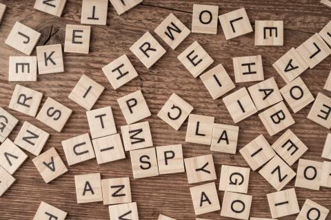 Scrabble tiles on a wooden table